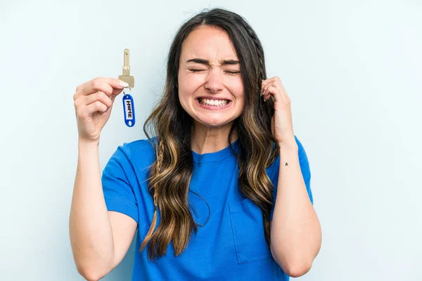 Young Caucasian Woman Holding Home Keys Isolated Blue Background Covering — Photo