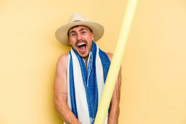 Young Caucasian Man Holding Foam Stick Isolated Yellow Background — 图库照片