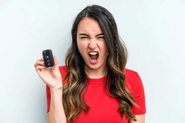 Young Caucasian Woman Holding Car Keys Isolated Blue Background Screaming — Stock fotografie