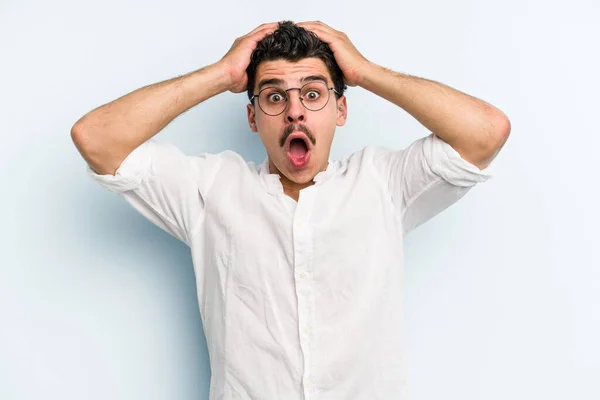 Young Caucasian Man Isolated Blue Background Surprised Shocked — Stock Photo, Image