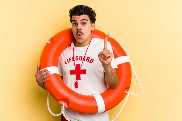 Young Caucasian Lifeguard Man Isolated Yellow Background Having Some Great — 图库照片
