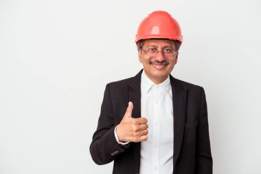 Middle aged indian architect man isolated on white background smiling and raising thumb up
