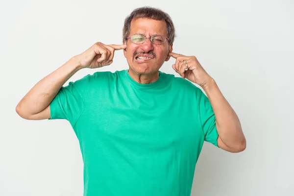 Middle Aged Indian Man Isolated White Background Covering Ears Fingers — Stockfoto
