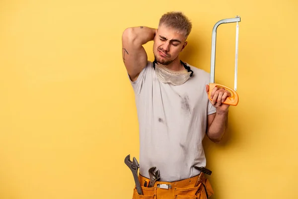 Young Electrician Caucasian Man Isolated Yellow Background Touching Back Head — 스톡 사진