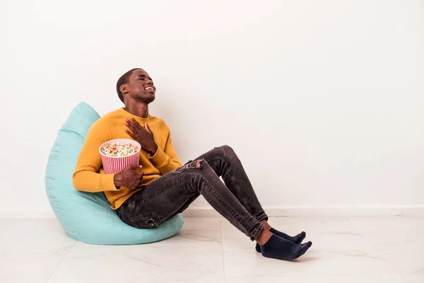 Young African American Man Sitting Puff Eating Popcorn Isolated White — Stock Photo, Image