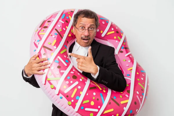 Senior Indian Business Man Holding Inflatable Donut Isolated White Background — Zdjęcie stockowe