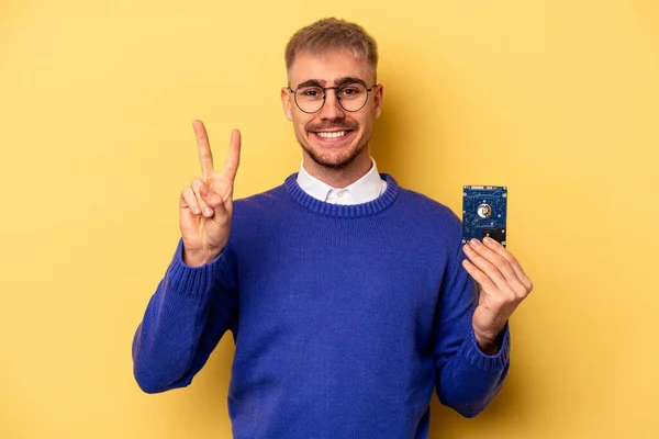 Young Computer Man Isolated Yellow Background Showing Number Two Fingers — Stock fotografie