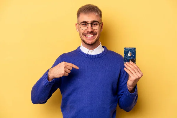 Young Computer Man Isolated Yellow Background Person Pointing Hand Shirt — Stock Fotó