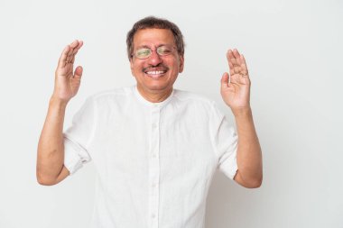 Middle aged indian man isolated on white background joyful laughing a lot. Happiness concept.
