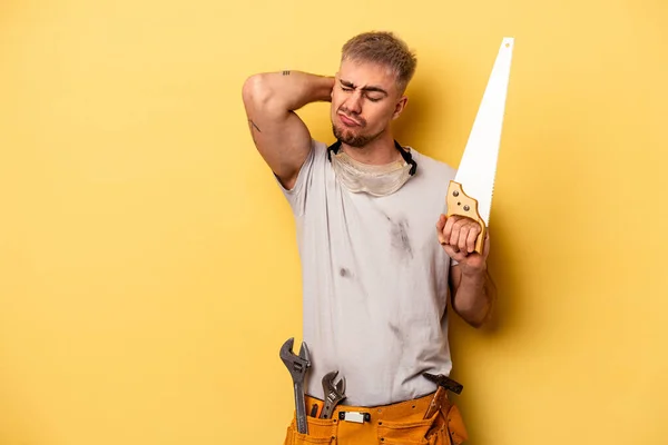 Young Electrician Caucasian Man Isolated Yellow Background Touching Back Head — Foto Stock