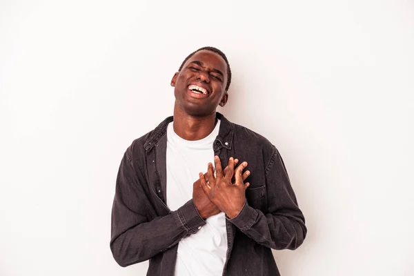 Jovem Afro Americano Isolado Fundo Branco Rindo Mantendo Mãos Coração — Fotografia de Stock