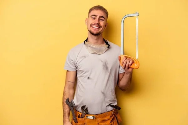 Young Electrician Caucasian Man Isolated Yellow Background Happy Smiling Cheerful — Fotografia de Stock