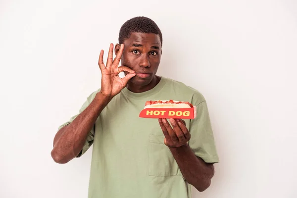 Young African American Man Eating Hot Dog Isolated White Background — Stock Photo, Image