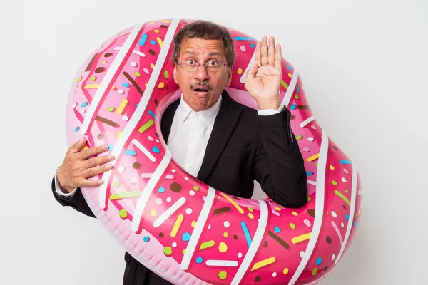 Senior Indian Business Man Holding Inflatable Donut Isolated White Background — 图库照片
