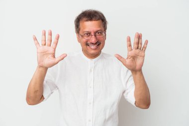 Middle aged indian man isolated on white background showing number ten with hands.