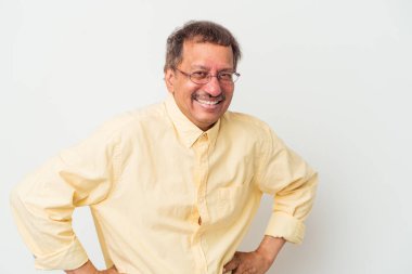 Middle aged indian man isolated on white background happy, smiling and cheerful.