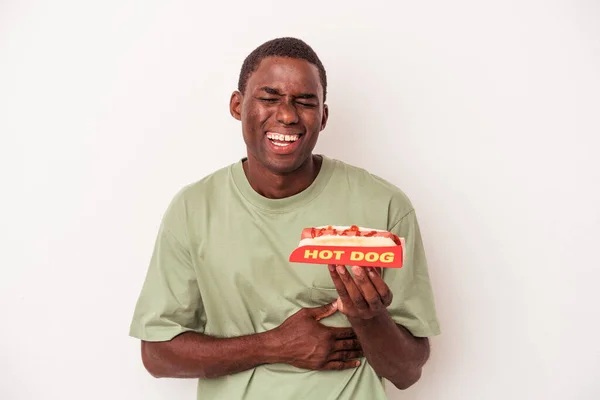 Young African American Man Eating Hot Dog Isolated White Background — Stock Photo, Image