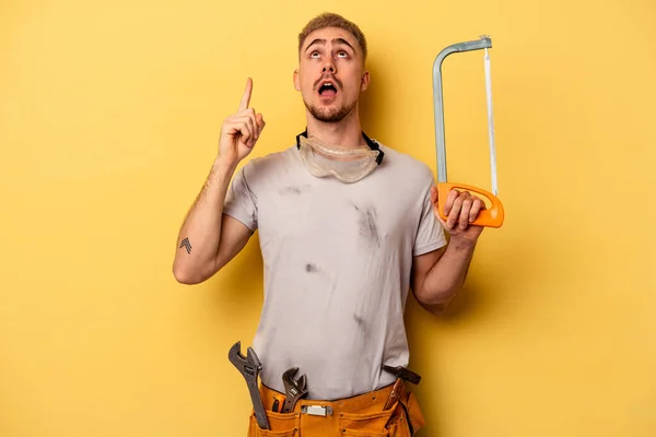 Young Electrician Caucasian Man Isolated Yellow Background Pointing Upside Opened — Stock Fotó