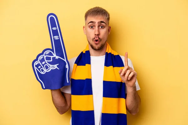 Young Sports Fan Caucasian Man Isolated Yellow Background Having Some — Foto Stock