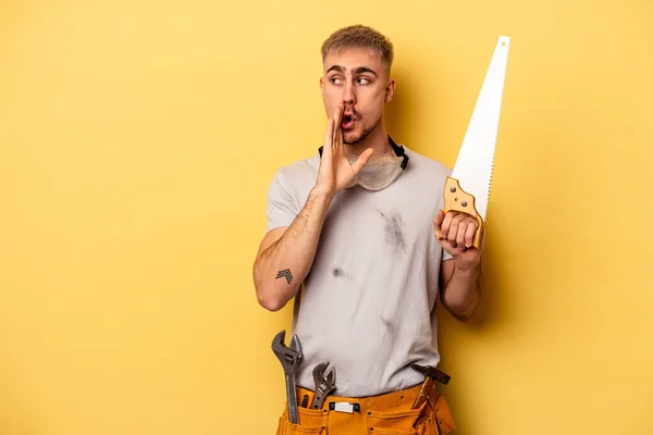 Young Electrician Caucasian Man Isolated Yellow Background Saying Secret Hot — Zdjęcie stockowe