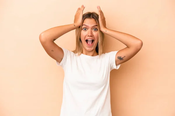 Young Caucasian Woman Isolated Beige Background Screaming Very Excited Passionate — Stock Photo, Image