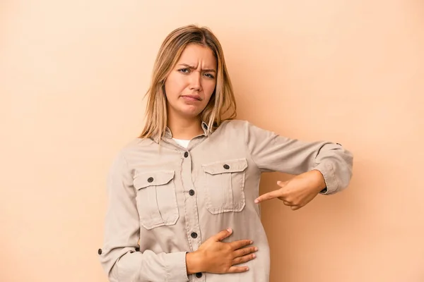 Young Caucasian Woman Isolated Beige Background Having Liver Pain Stomach — Stock Photo, Image