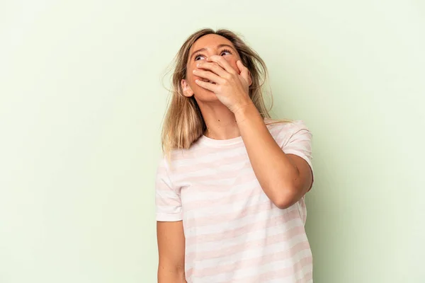 Young Caucasian Woman Isolated Green Background Laughing Happy Carefree Natural — Stock Photo, Image
