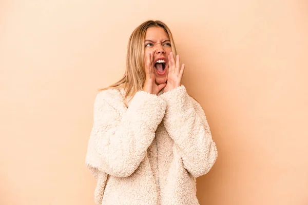 Young Caucasian Woman Isolated Beige Background Shouting Excited Front — Stock Photo, Image