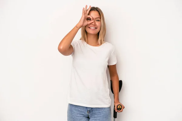 Young Caucasian Woman Holding Crutch Isolated White Background Excited Keeping — Stok fotoğraf