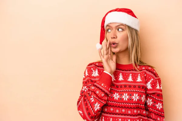 Young Caucasian Woman Celebrating Christmas Isolated Beige Background Saying Secret — Stock fotografie