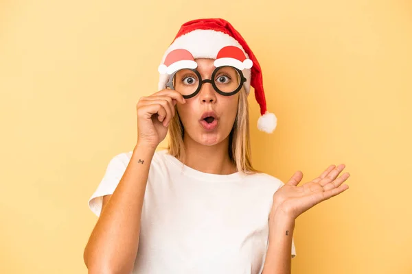Young Caucasian Woman Holding Christmas Props Isolated Yellow Background — Stock Photo, Image