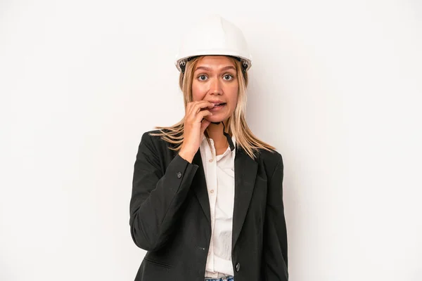Young Caucasian Architect Woman Wearing Helmet Isolated White Background Biting — Stockfoto