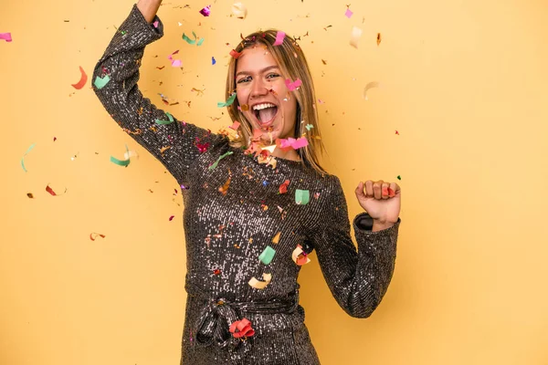 Young Caucasian Woman Celebrating New Year Confetti Isolated Yellow Background — Stockfoto
