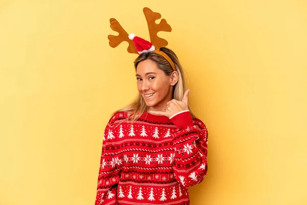 Young Caucasian Woman Wearing Christmas Reindeer Hat Isolated Beige Background — Stok fotoğraf