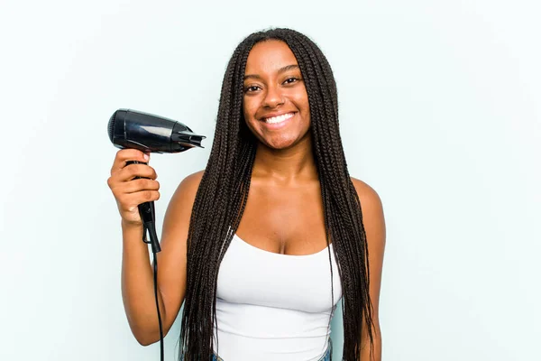 Young African American Woman Holding Hairdryer Isolated Blue Background Happy — Stock Photo, Image