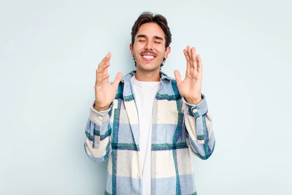 Young Hispanic Man Isolated Blue Background Joyful Laughing Lot Happiness — стоковое фото