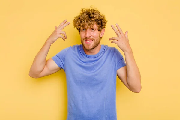 Young Caucasian Man Isolated Yellow Background Showing Disappointment Gesture Forefinger — Stock Photo, Image