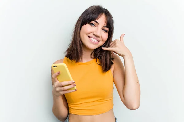 Young Caucasian Woman Using Mobile Phone Isolated White Background Showing — Stock Photo, Image