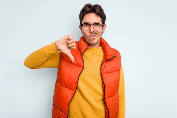 Young Hispanic Man Isolated Blue Background Showing Thumb Disappointment Concept — Stock Photo, Image