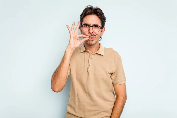 Young Hispanic Man Isolated Blue Background Fingers Lips Keeping Secret — Stock Photo, Image
