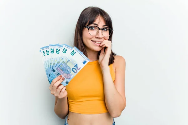 Young Caucasian Woman Holding Banknotes Isolated Blue Background Biting Fingernails — Stock Photo, Image
