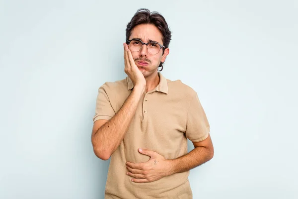 Young Hispanic Man Isolated Blue Background Blows Cheeks Has Tired — Stock Photo, Image