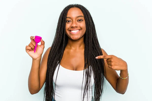 Young African American Woman Holding Menstrual Cup Isolated Blue Background — Stock Photo, Image