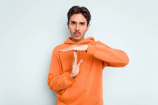 Young Hispanic Man Isolated Blue Background Showing Timeout Gesture — стоковое фото