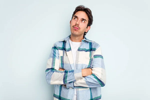 Young Hispanic Man Isolated Blue Background Tired Repetitive Task — Stock Photo, Image