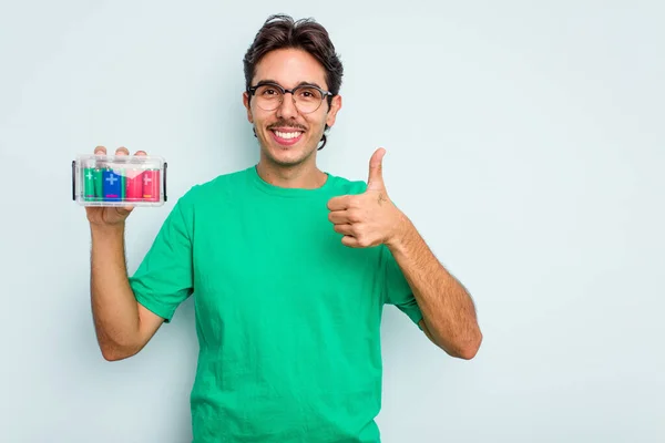 Young Hispanic Man Holding Battery Box Isolated White Background Smiling — Stock Photo, Image