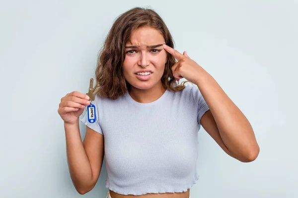 Young Caucasian Woman Holding Home Keys Isolated Blue Background Showing — Foto Stock