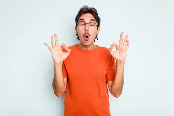 Young Hispanic Man Isolated Blue Background Relaxes Hard Working Day — Stock Photo, Image