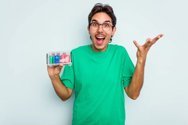 Young Hispanic Man Holding Battery Box Isolated White Background Receiving — Stock Photo, Image