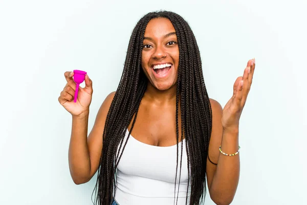 Young African American Woman Holding Menstrual Cup Isolated Blue Background — Stock Photo, Image